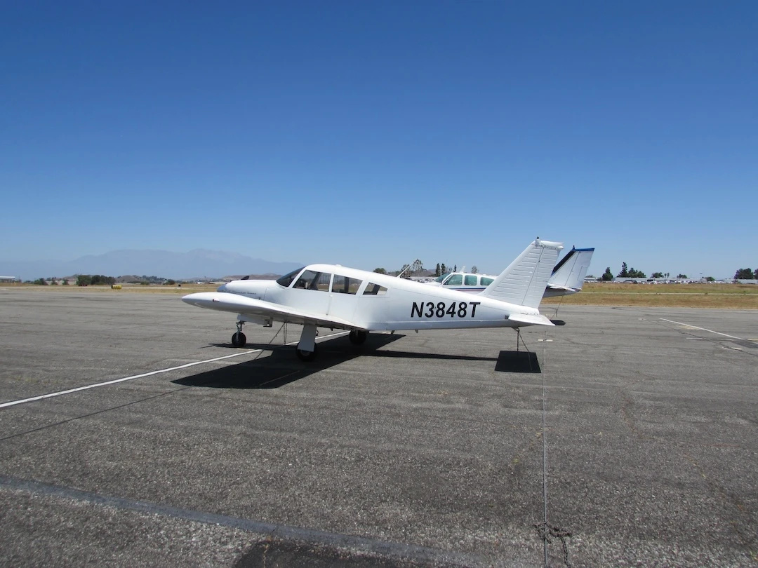 Side angle of Piper Cherokee airplane