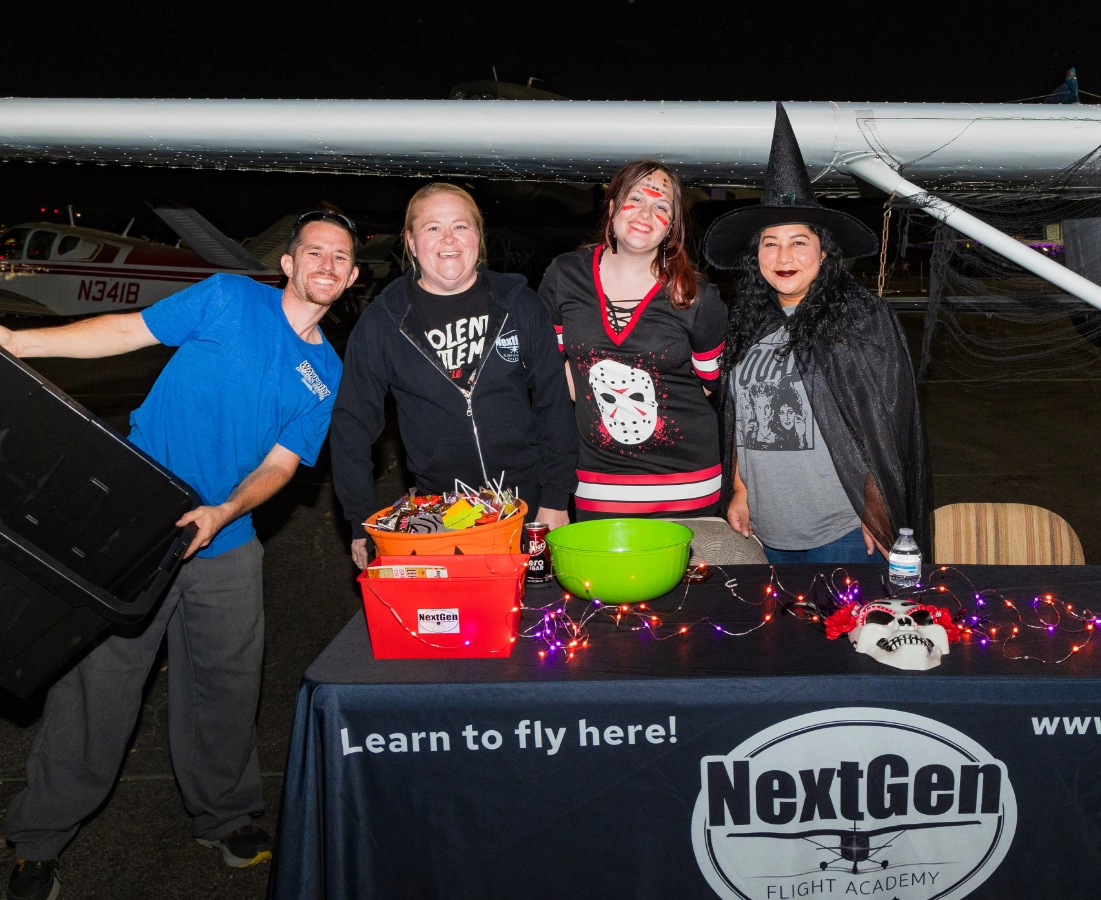 NextGen Flight Academy staff celebrating halloween in different costumes